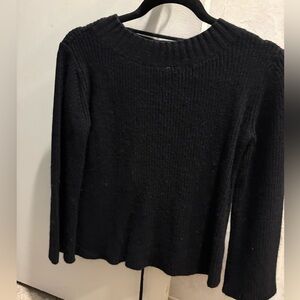 Black rib knit sweater with tie back and slight bell sleeve